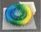 流動解析ヒートマップをフルカラー3Dプリントした円形キャップ模型のサンプル。